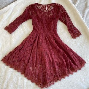 Free People. Size 0. Ivy lace, maroon long sleeve dress. Hem uneven